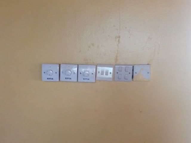 Light switches and sockets on the hall wall